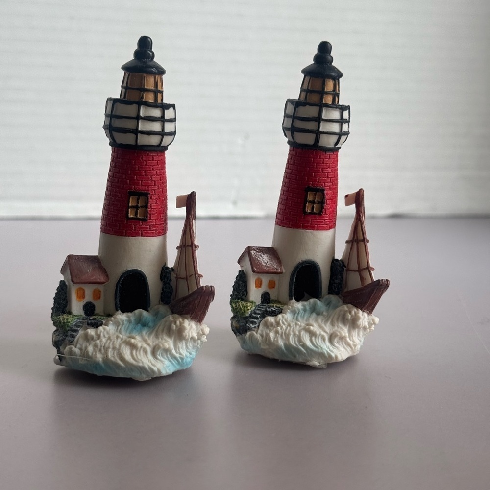 Red and White Lighthouse Figurine Set